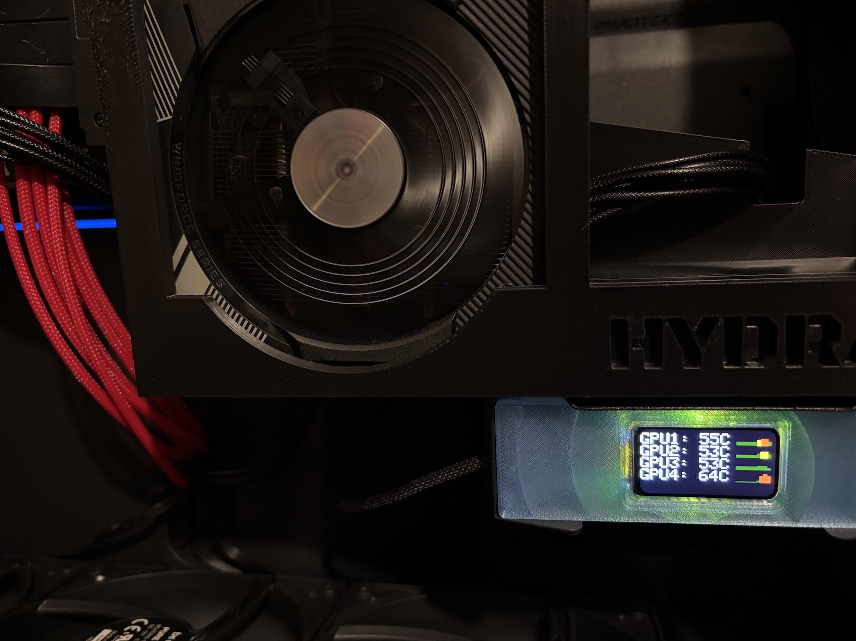 ESP32-powered display showing GPU temperatures with simple graphs